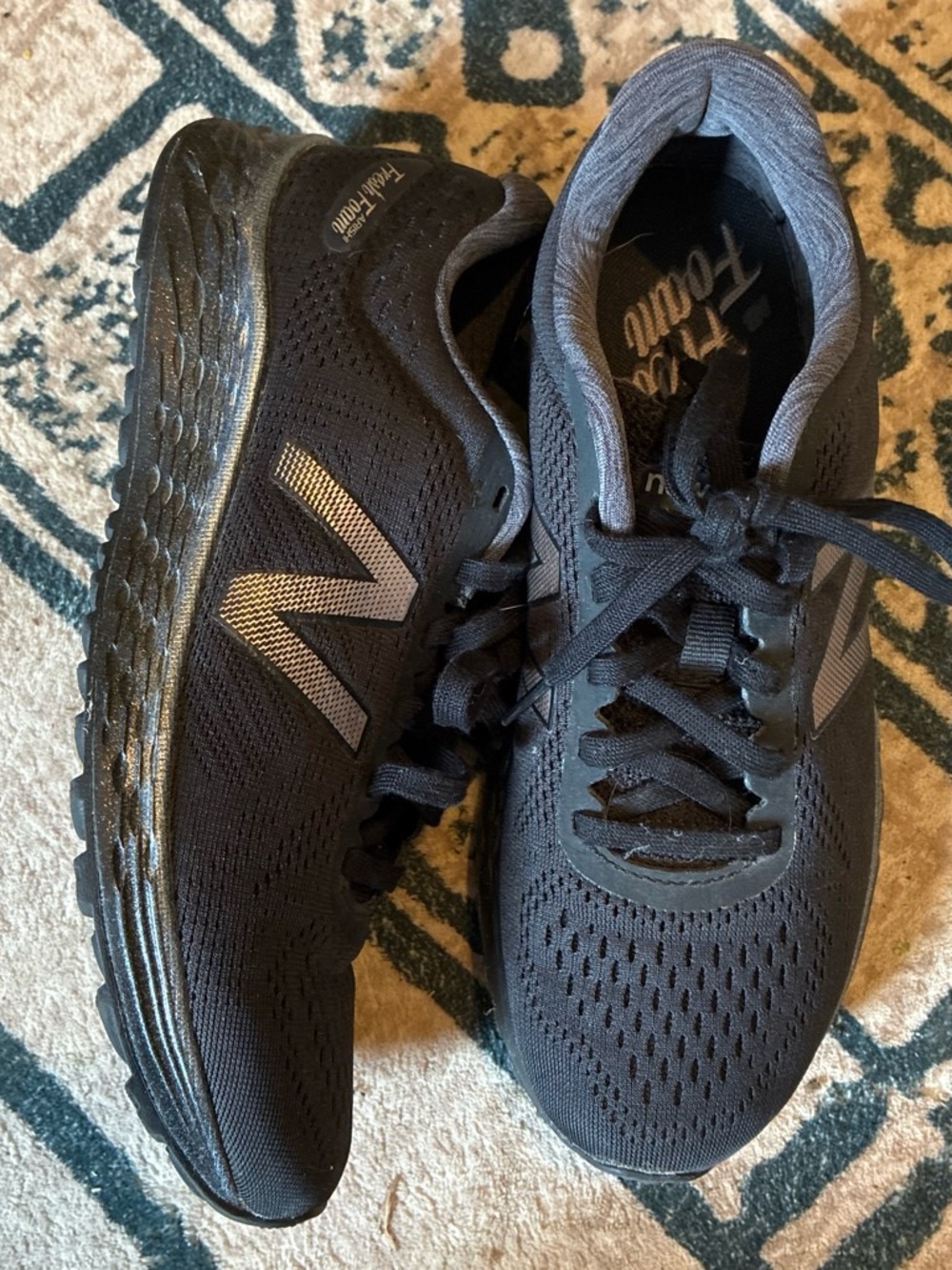 New Balance womens Black Athletic Running Shoes with Reflective N Logo